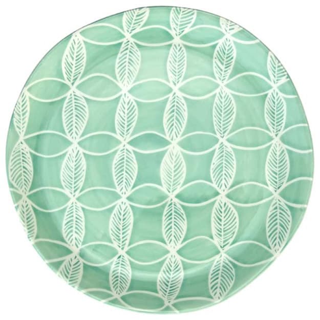 Ein runder, hellgrüner Keramikteller mit einem sich wiederholenden weißen Blattmuster.